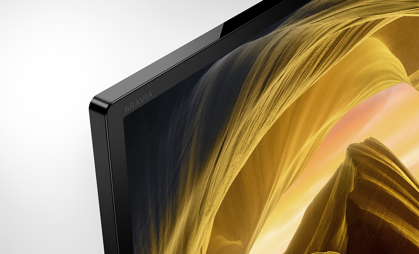 Close-up of the bezel of W830L Series BRAVIA TV with screenshot of rock formations